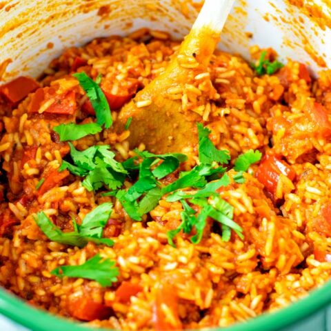 Fresh parsley is used for garnish of the Jollof Rice.