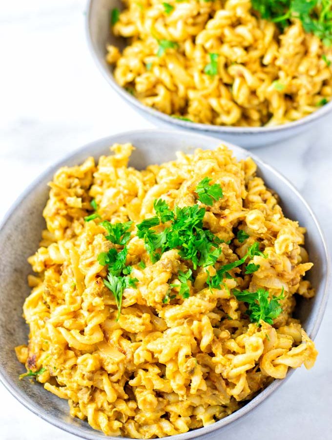 Closeup view of the pasta covered in creamy lentil sauce.