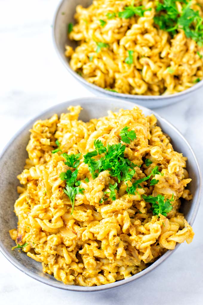 Closeup view of the pasta covered in creamy lentil sauce.