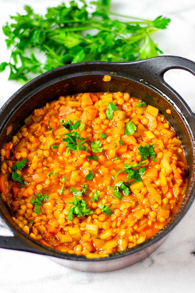 Closeup of the Red Lentil Soup in a pot, garnished with cilantro.