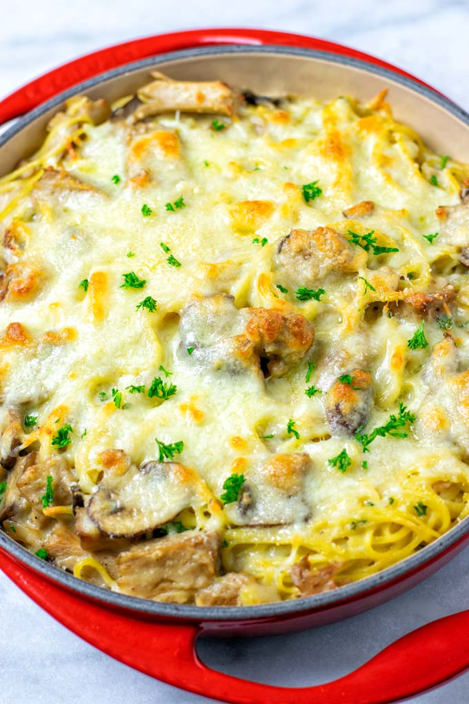 Closeup on the melted vegan cheese crust of this Tetrazzini casserole.