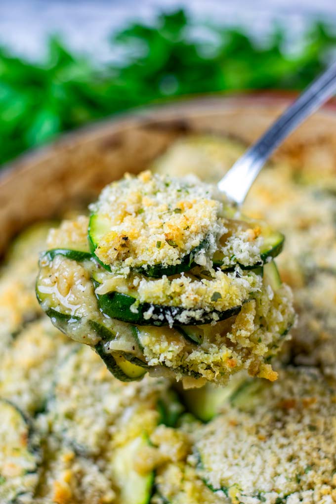 Closeup on the zucchini layers on a spoon.