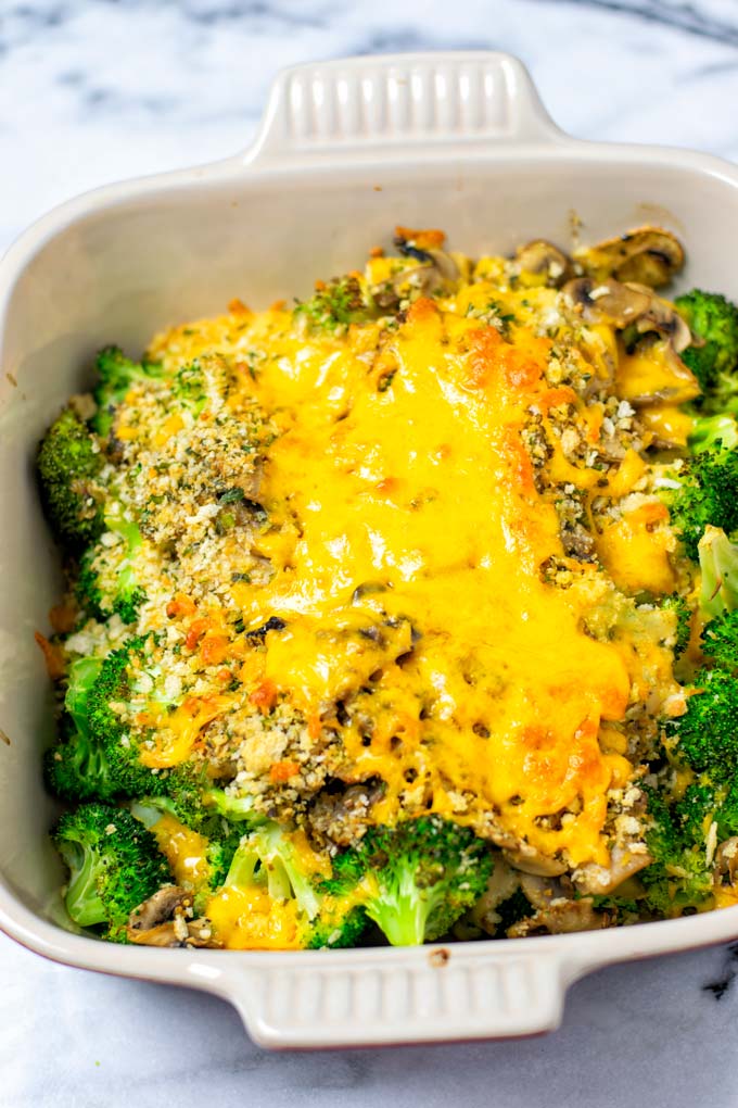 Broccoli Casserole done in a red casserole dish.