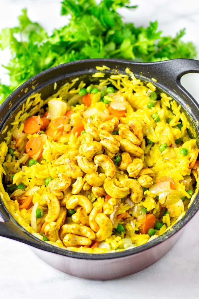 Closeup view of the toasted cashews topping the finished rice.