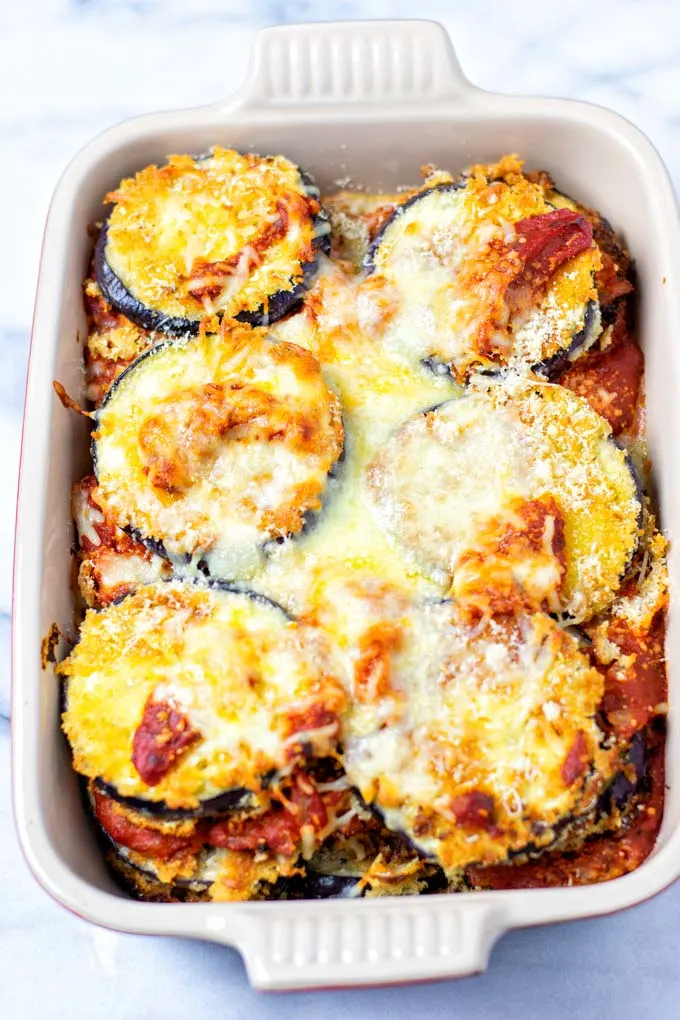 Eggplant Parmesan after baking in a casserole dish.