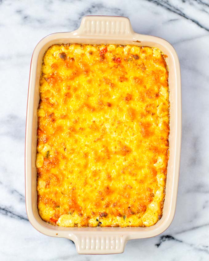 Corn Dip with golden brown vrust in the casserole dish after baking.