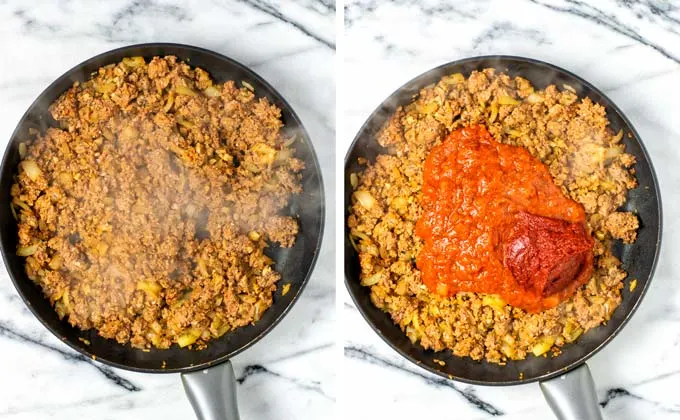 Fired ground beef mixture is combined with tomato sauce and tomato paste.