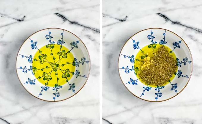 Showing a large bowl with the first steps of making the dressing: combining oil, herbs.