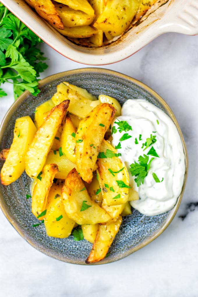 Top view on a portion of Greek Lemon Potatoes. 