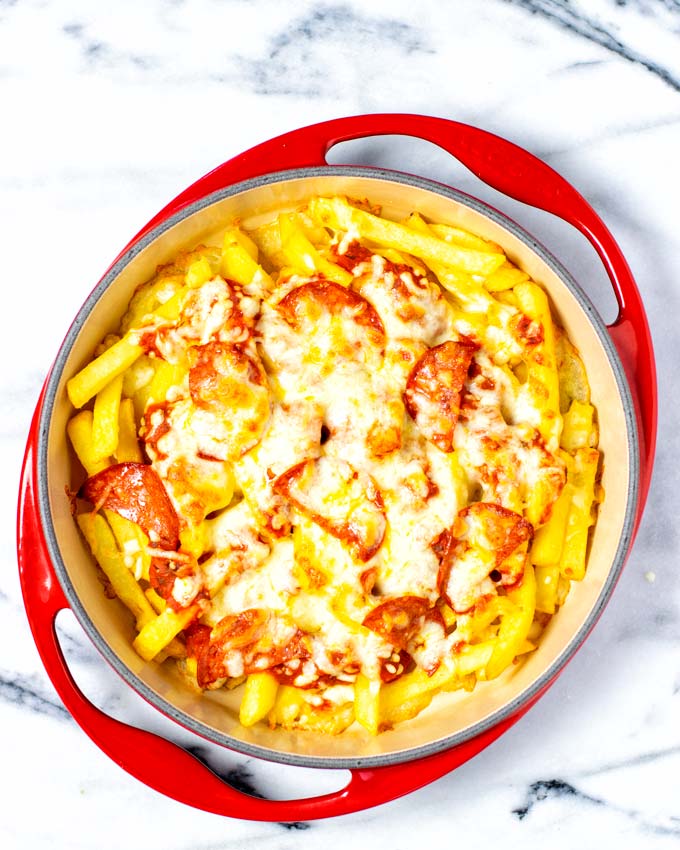 View from above on a casserole dish with the Pizza Fries after baking in the oven.