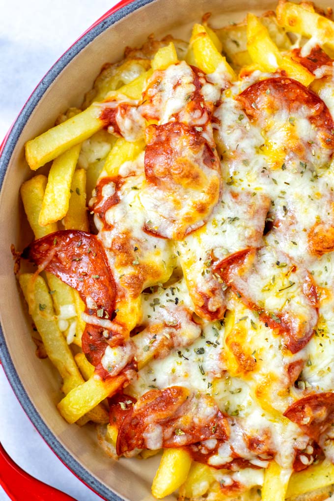 Top view on the casserole dish with the ready fries.