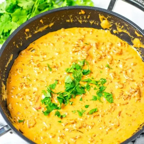 View on the ready Rotel Dip with fresh cilantro garnish.