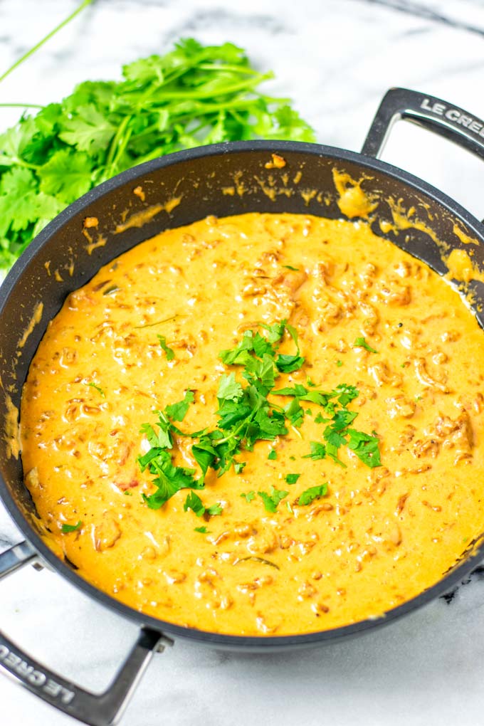 View on the ready Rotel Dip with fresh cilantro garnish.