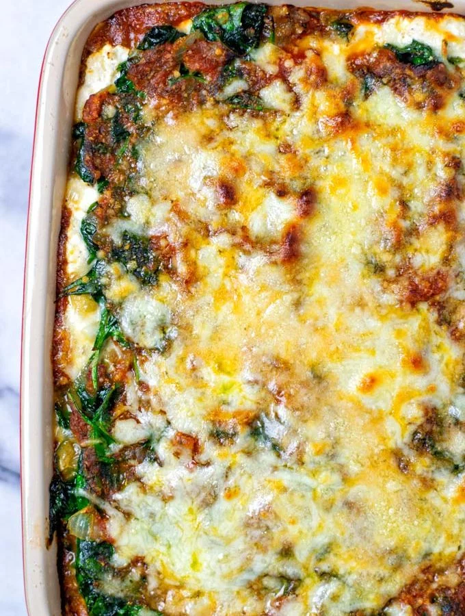 A full casserole dish with the oven baked Spinach Lasagna.