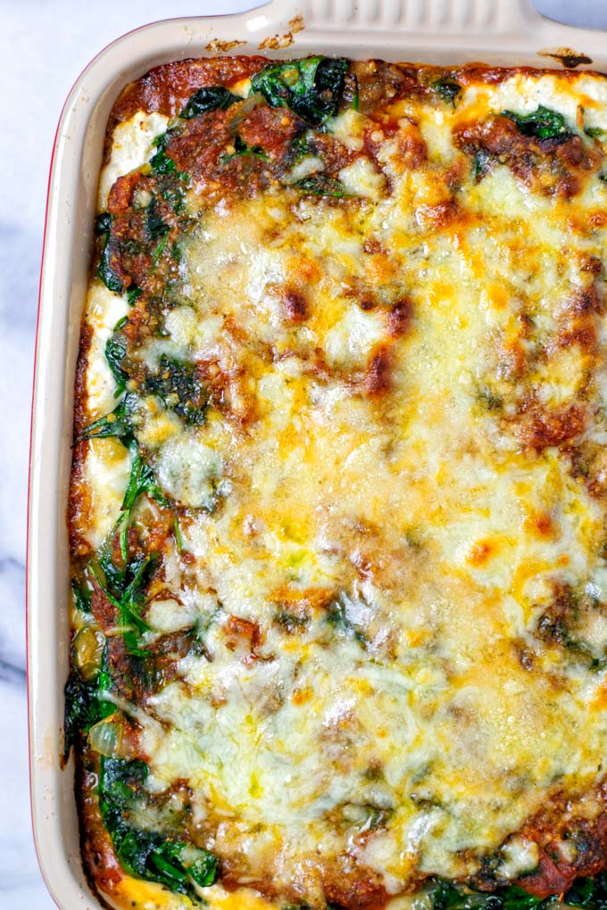 A full casserole dish with the oven baked Spinach Lasagna.