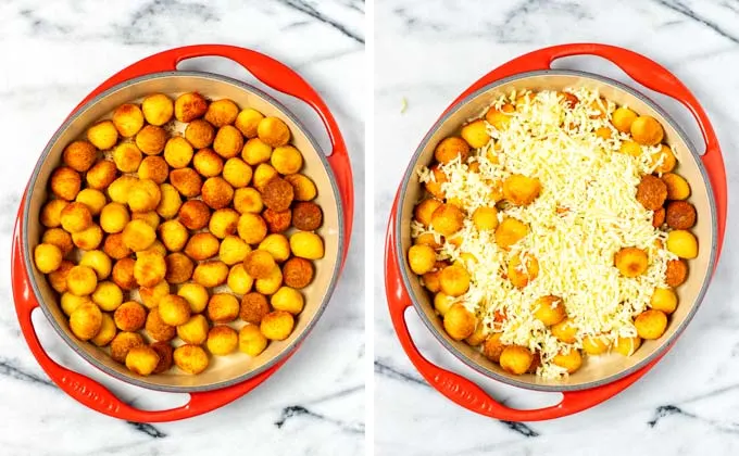 Tater tots have been transferred to a large round casserole dish and then topped with vegan cheese.
