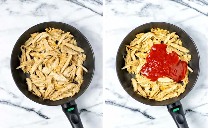 Vegan chicken stripes are fried in a medium size frying pan and mixed with hot sauce.