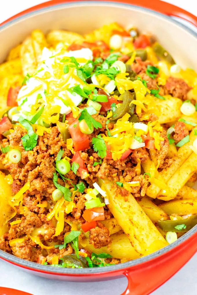 Closeup of the ready Nacho Fries in a large dish.