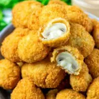 Another view on the ready Fried Mushrooms in a large plate.