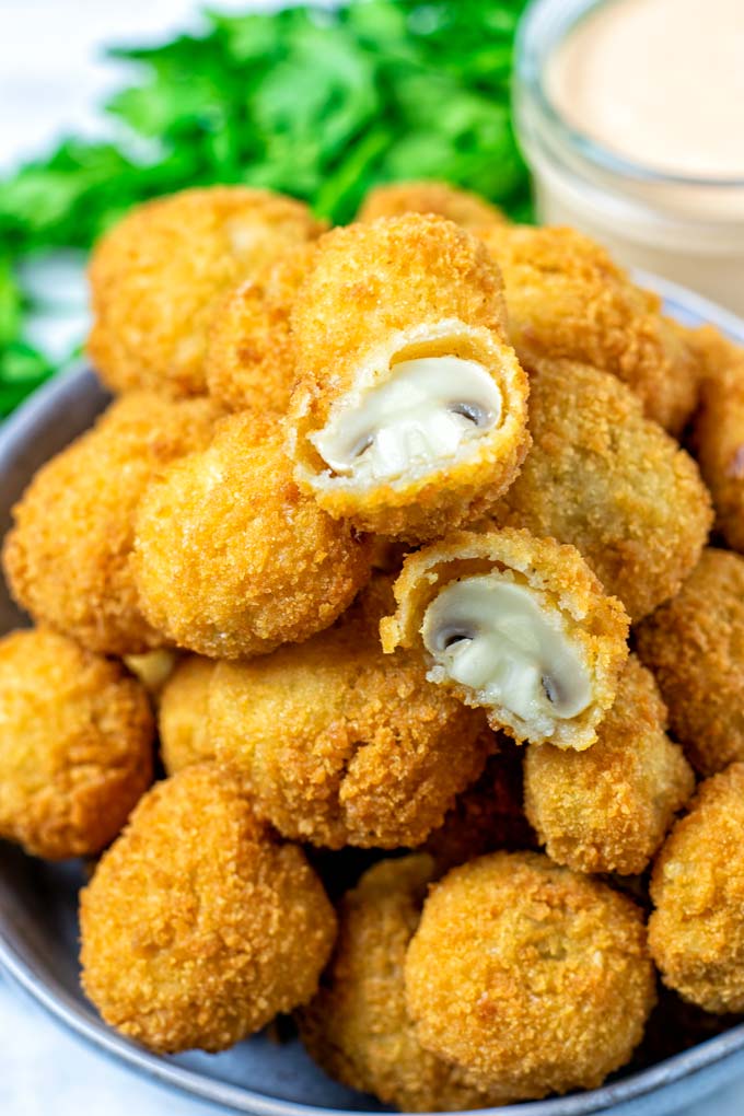 Another view on the ready Fried Mushrooms in a large plate.