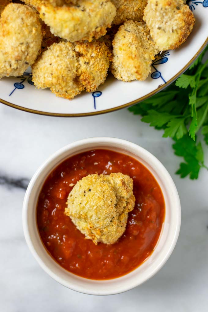 Cauliflower Bites in dipping sauce.