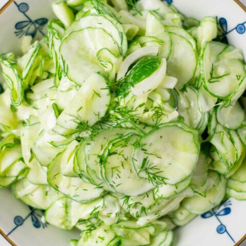 Top view of a bowl with the Creamy Cucumber Salad.