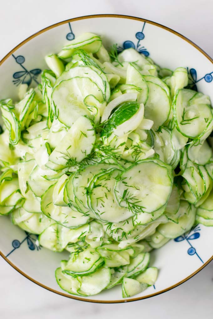 Top view of a bowl with the Creamy Cucumber Salad.