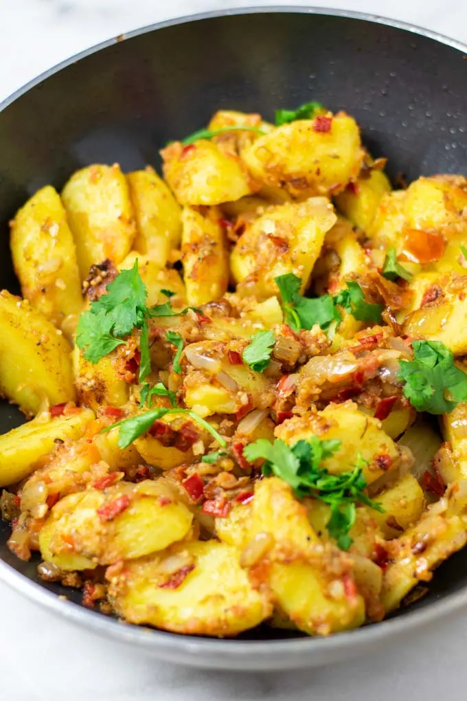 Bombay Potatoes in a big pan.