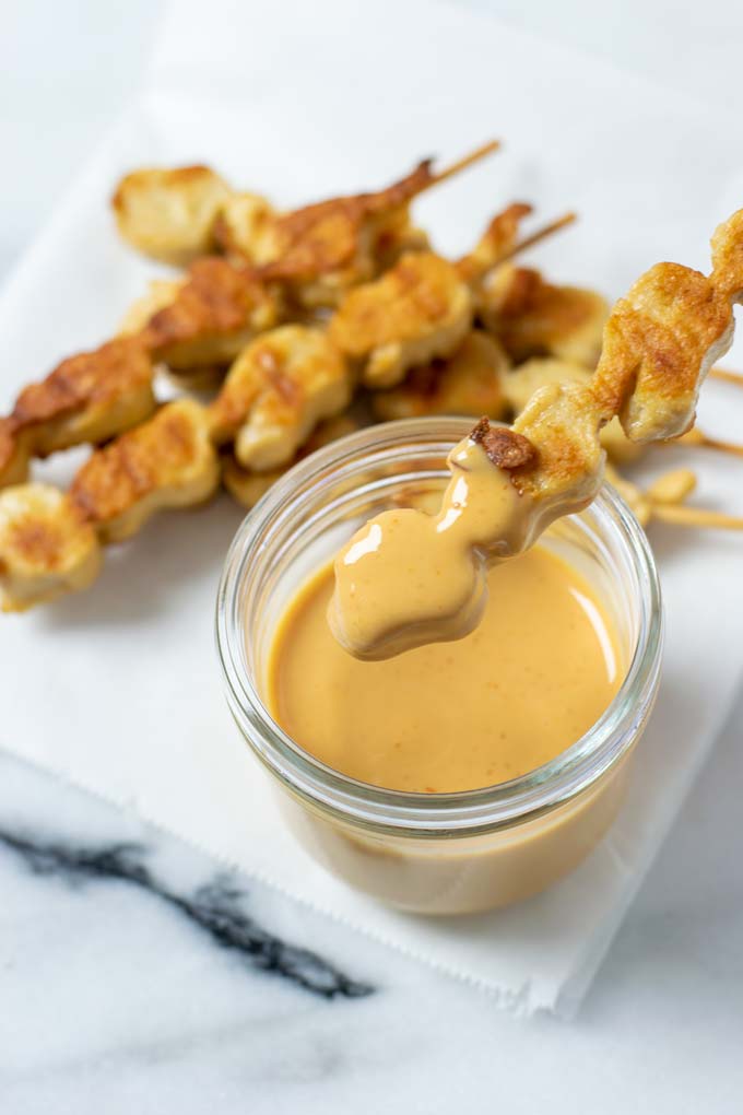 Vegan chicken skewers after dipping into Cane's Sauce.