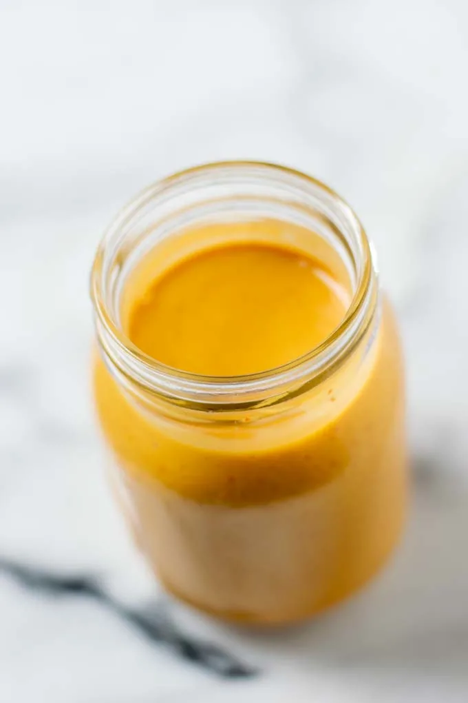 The ready Comeback Sauce in a glass jar.