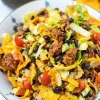 Ready to eat Dorito Taco Salad in a serving bowl.