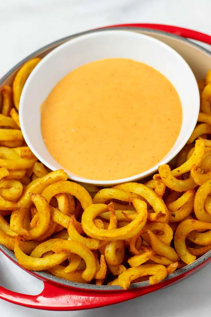 The Boom Boom sauce is served with curly fries from the oven.