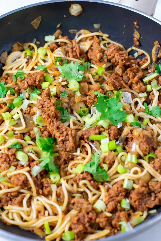Close up view on the noodles with vegan ground beef crumbles.
