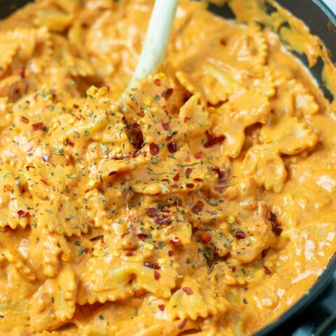 Closeup on the Creamy Tomato Pasta, garnished with chili flakes.