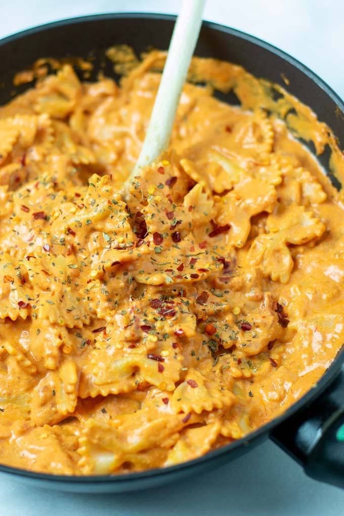Closeup on the Creamy Tomato Pasta, garnished with chili flakes.