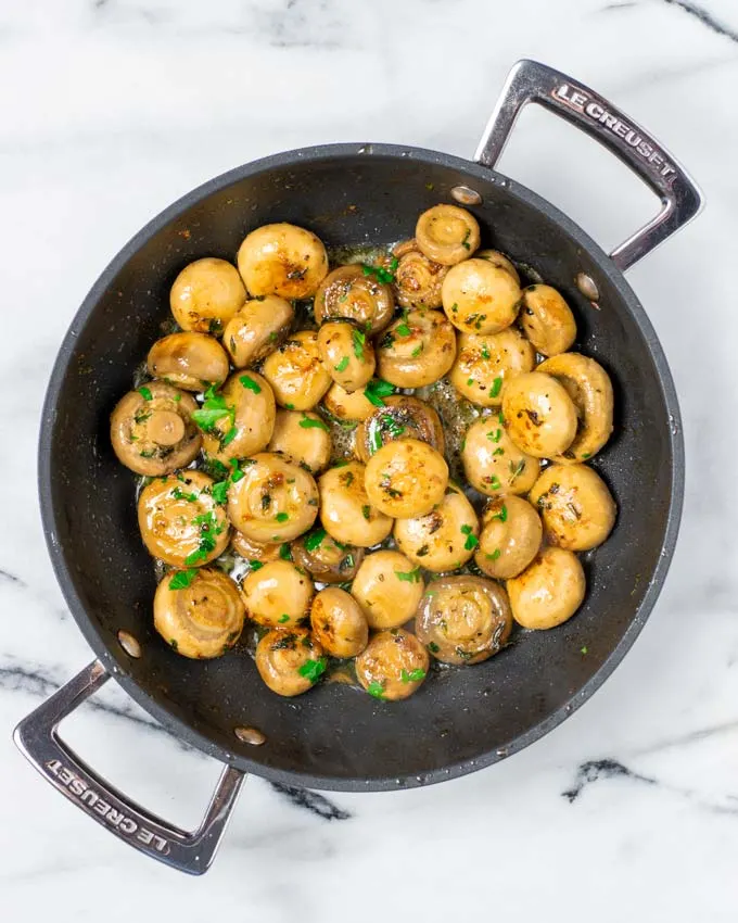 Top view of the Garlic Mushrooms in a frying pan.