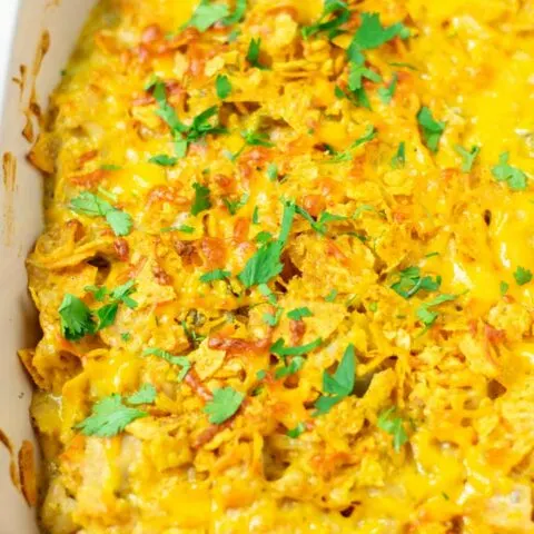 Closeup of a casserole dish with the Nacho Chicken garnished with fresh cilantro.