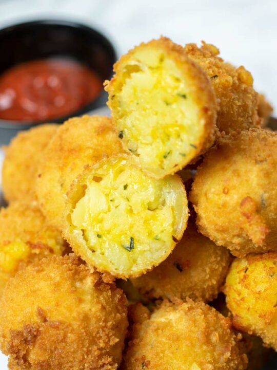 Closeup of an opened Potato Cheese Ball.