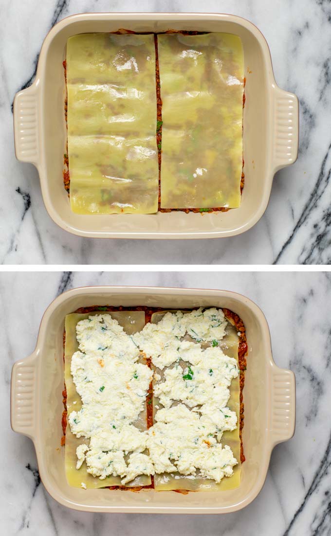 Showing the layering of the lasagna with noodles and cheesy filling.