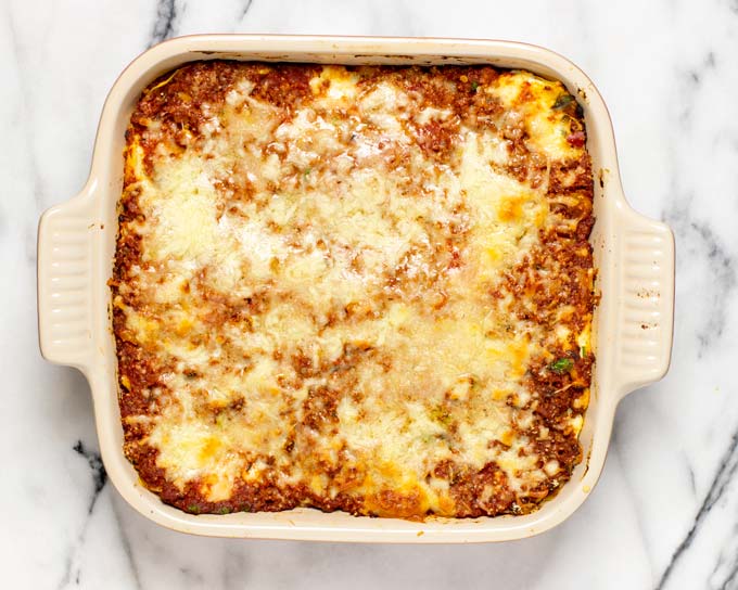 Top view of a baking dish with the bakes Easy Homemade Lasagna.