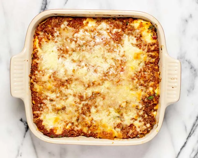 Top view of a baking dish with the bakes Easy Homemade Lasagna.