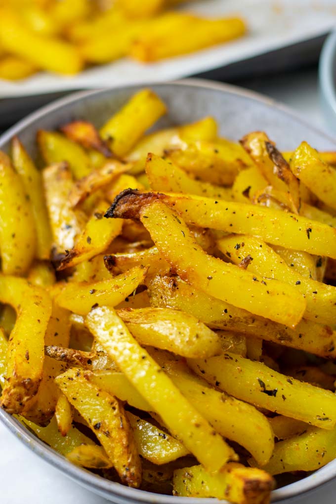 Zoom in into the Cajun Fries, showing the crispy outside.