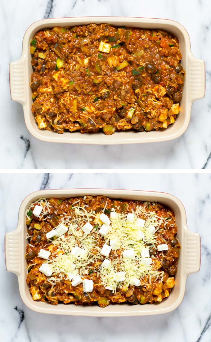 The Zucchini Bake is transferred to a casserole dish and topped with more vegan cheese.