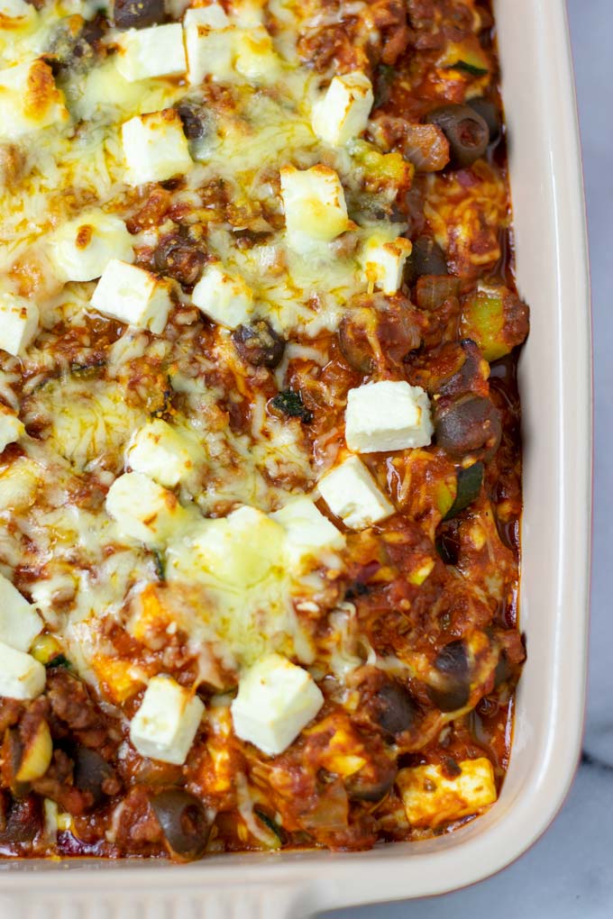 Top view of the Zucchini Bake with a closeup of the melted vegan cheese.