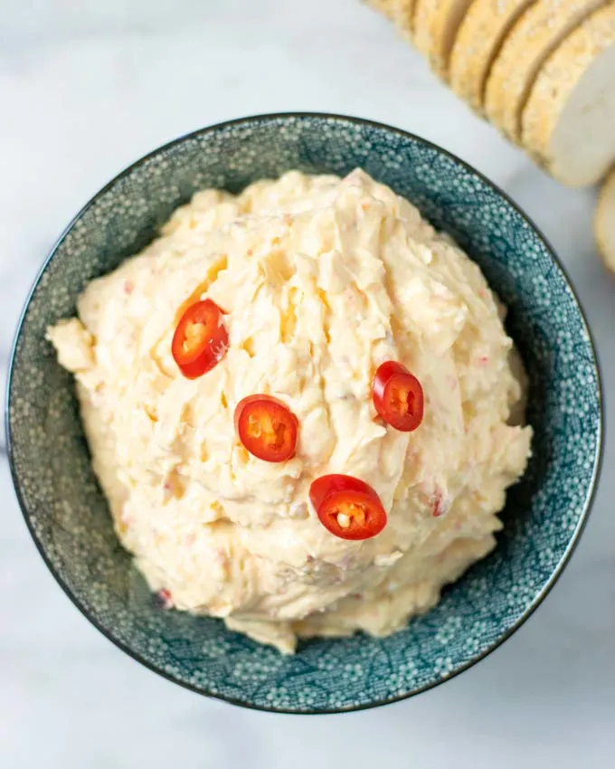 Top view on a large serving bowl with the Greek Feta Dip.