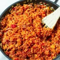 Closeup of the Tomato Rice cooked in a pan.