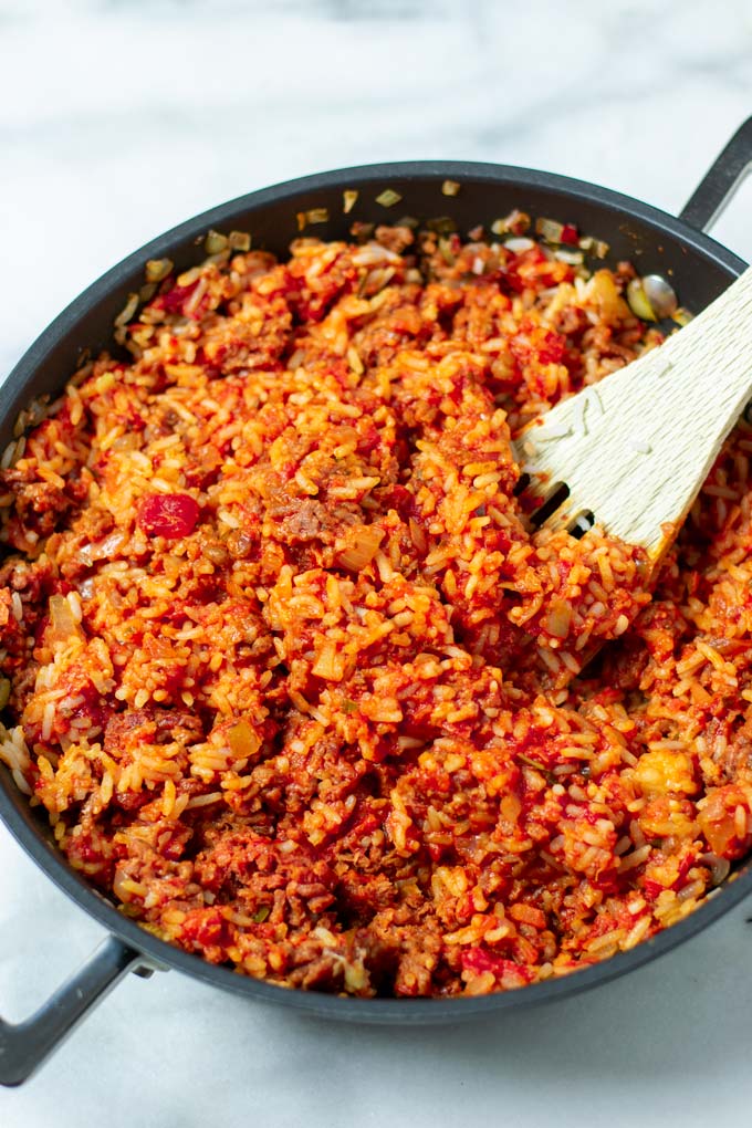 Closeup of the Tomato Rice cooked in a pan.