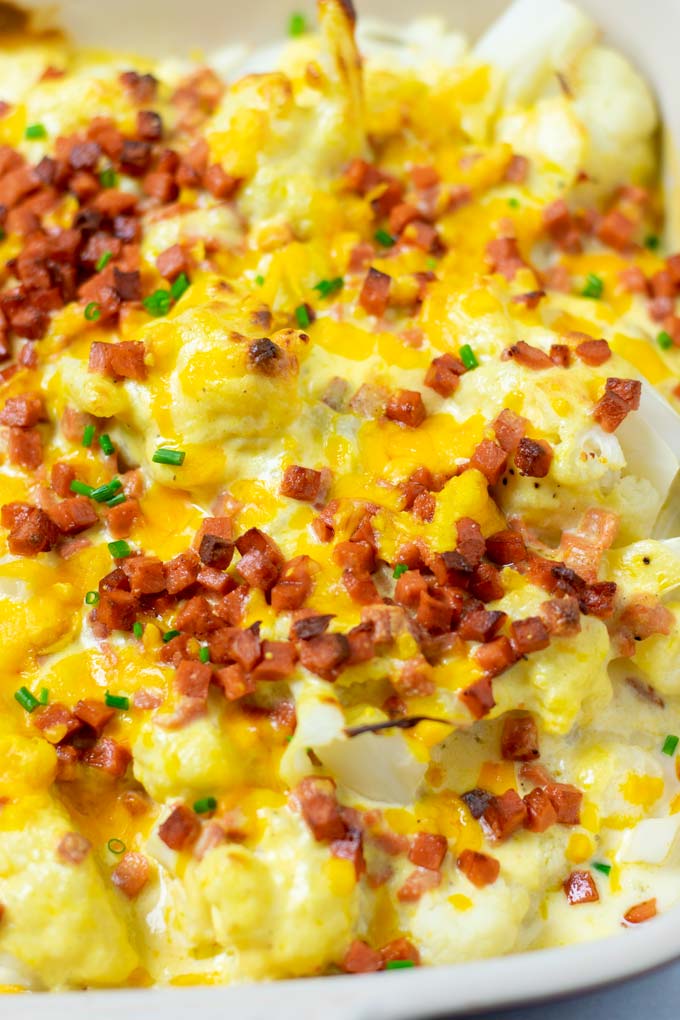 Closeup view of the top of the Cauliflower Bake with the cheese and bacon topping. 