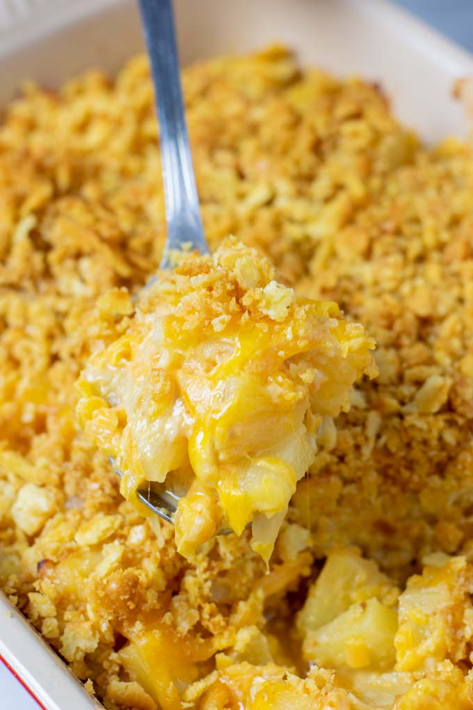 Closeup of a large spoonful of the Pineapple Casserole.