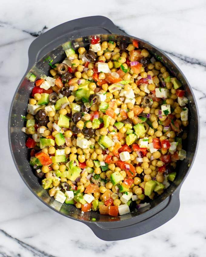 Top view of a large bowl with the Chickpea Salad after mixing.